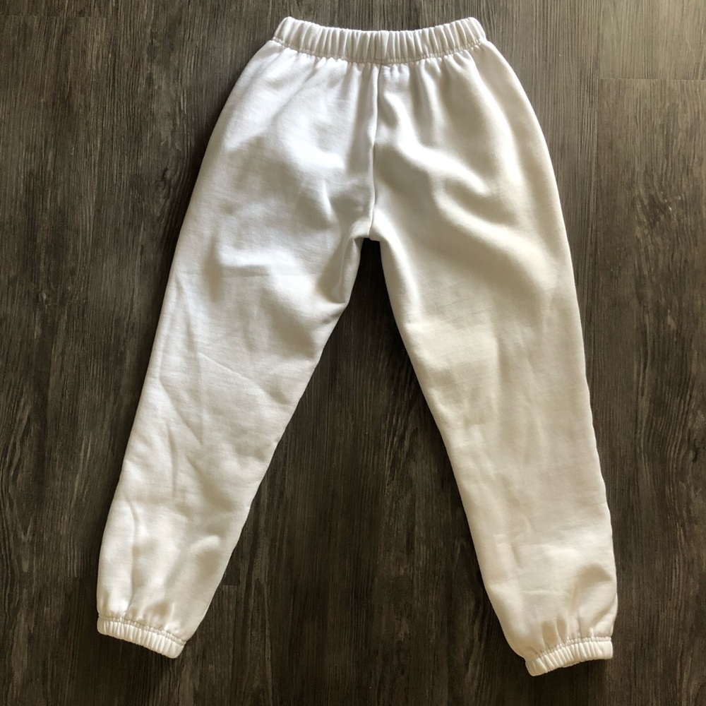 Ashlyn x Shop Hope’s white high waisted joggers
